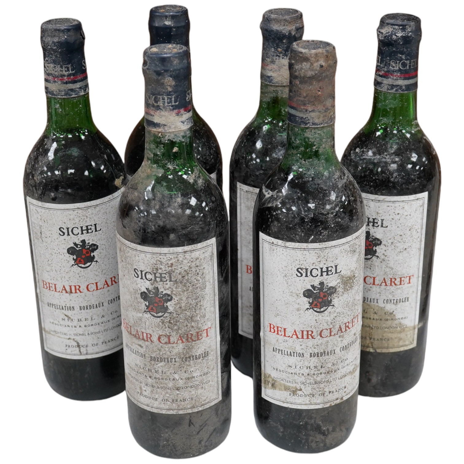 Six bottles of Sichel Belair Claret. Condition - dirty